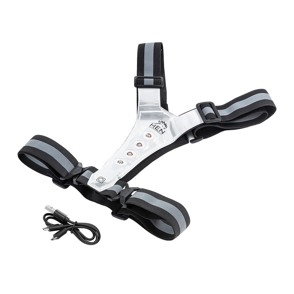 Zwart reflectievest met LED verlichting voor veilig hardlopen in het donker in verpakking